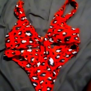 Orangeish red, cheetah print bathing suit